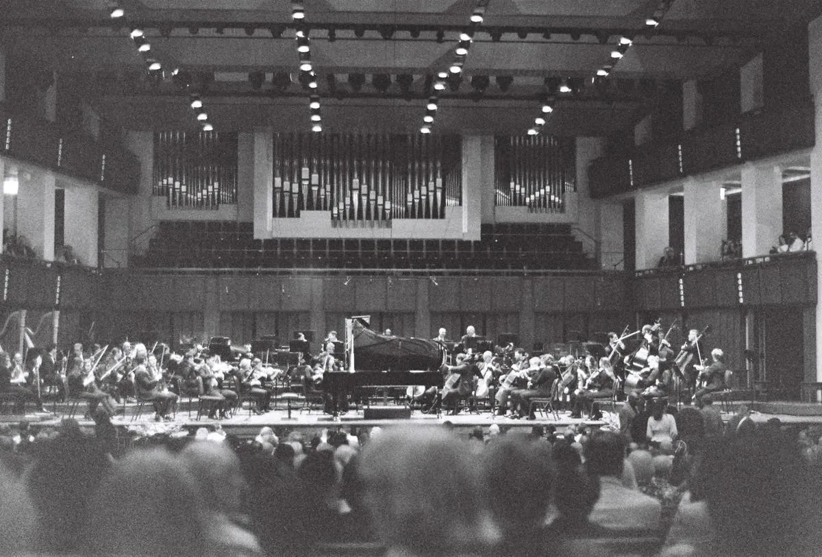 Before a piano concerto at the Kennedy Center. Classical music, especially piano, has always been close to my heart. However, you can find me listening to jazz, house, pop, rap, and more.