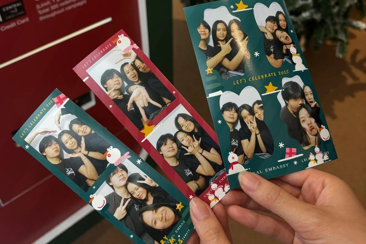 Photo booth chaos with my sisters. As a triplet, they've always been there for me, never letting life get boring.